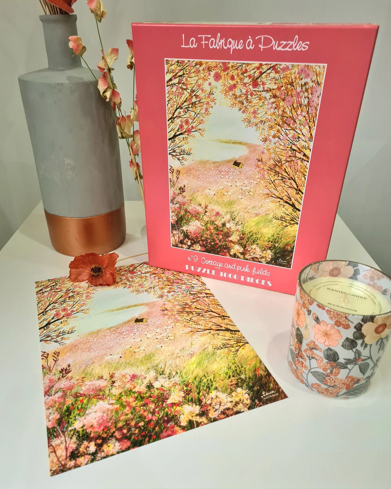Puzzle Cottage et champs roses de 1000 pièces