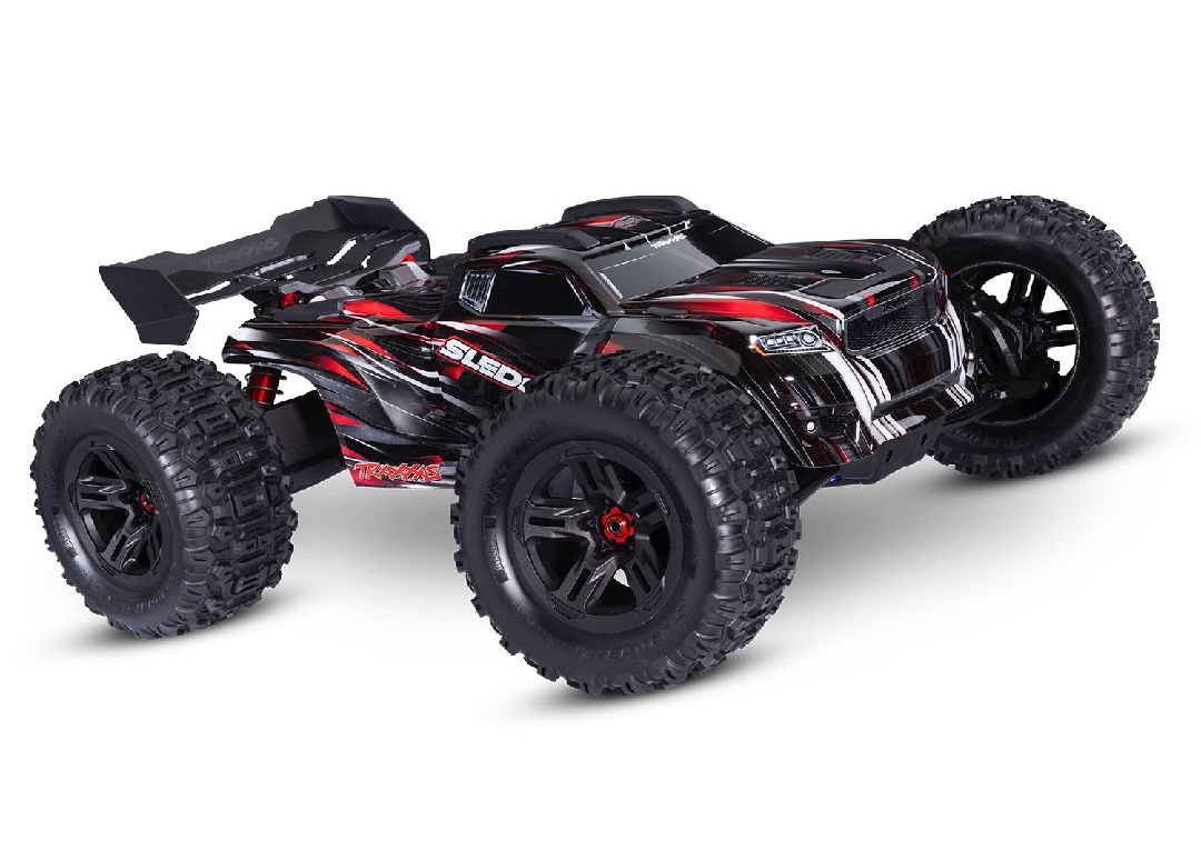 95096-4RED Traxxas Sledge 1/8 avec pneus Sledgehammer ceinturés - Rouge