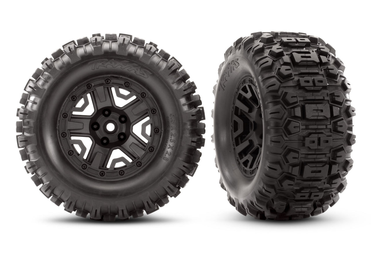 6792 Traxxas Tires & wheels, black, 2.8" / Sledgehammer wheel