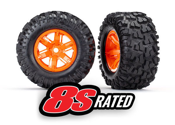 7772T  Tires & wheels, assembled, glued (X-Maxx® orange wheels, Maxx® AT tires, foam inserts) (left & right) (2)